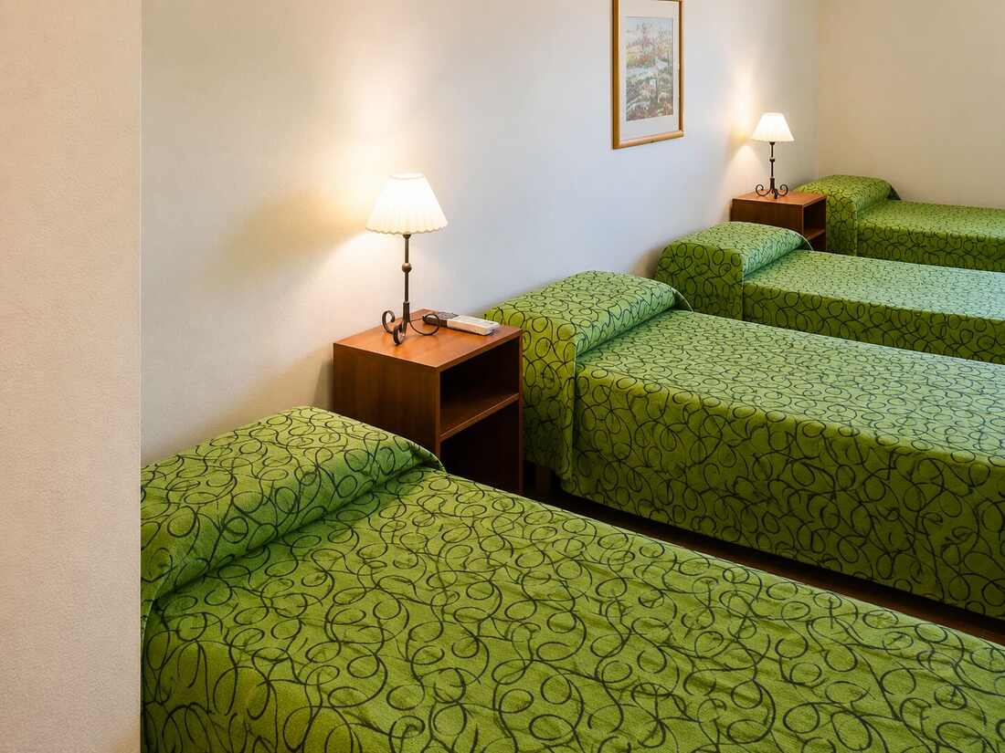 Habitación familiar triple con tres camas
